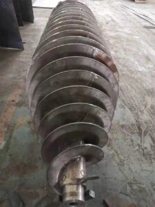 Assembled screw conveyor auger flight shaft for industrial bulk material handling applications