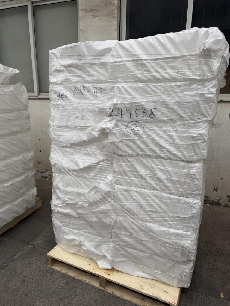 Elevator buckets and bucket elevator parts packed securely on pallets before shipping