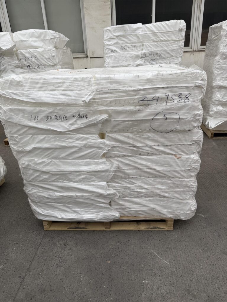 Pallet packing of elevator bucket components including buckets, bolts and belt clamps