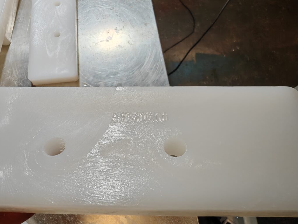 Custom UHMWPE conveyor flights manufactured for a drag chain conveyor project in Malaysia