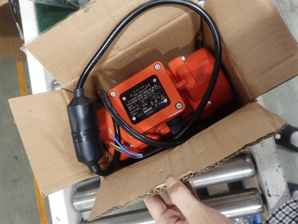 Complete industrial vibration motor inspected before delivery to the customer’s freight forwarder