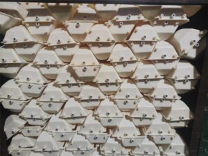 Batch of white DL3319 Z bucket elevator buckets with side mounting points