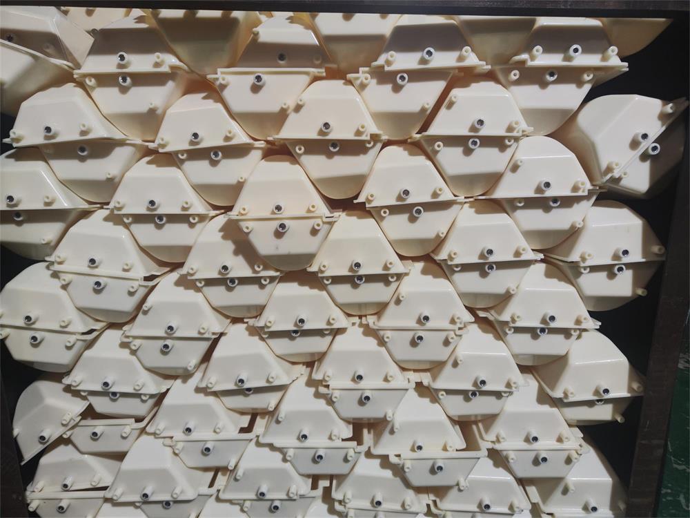 Batch of white DL3319 Z bucket elevator buckets with side mounting points