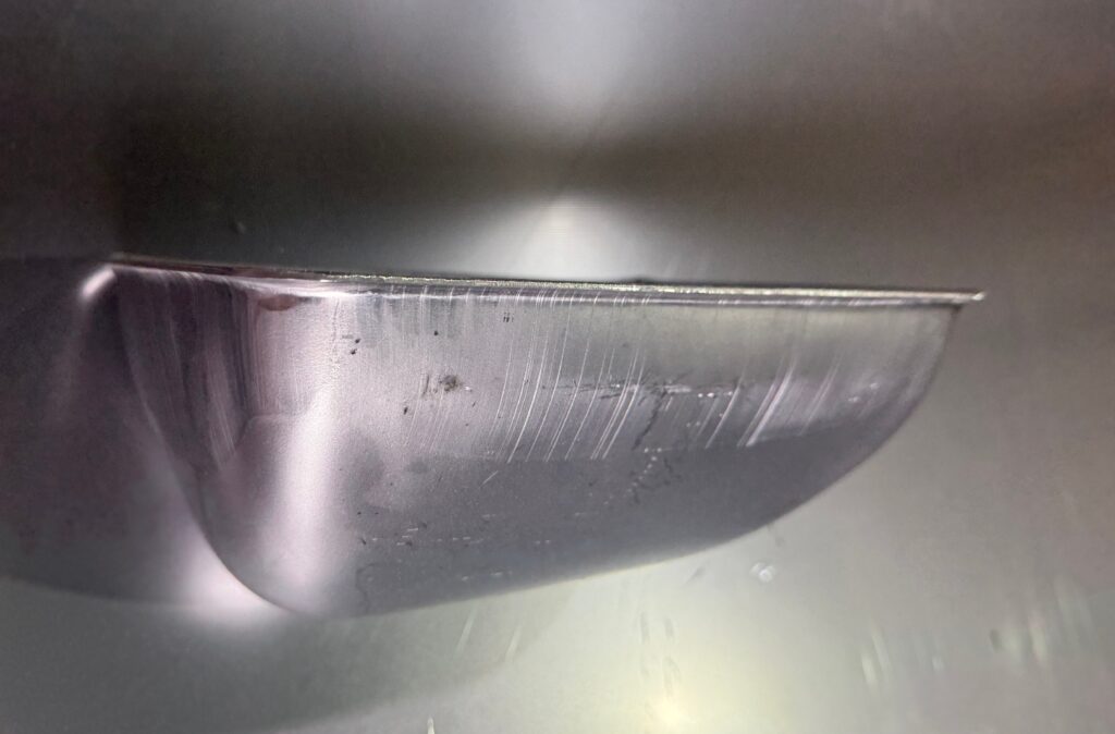 Deep bottom profile of a carbon steel DS elevator bucket